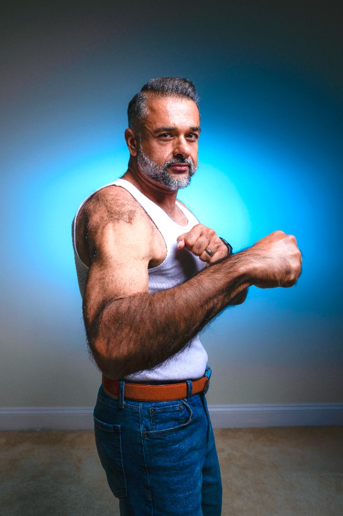 Fitness / Wellness - Blue lit muscular side pose