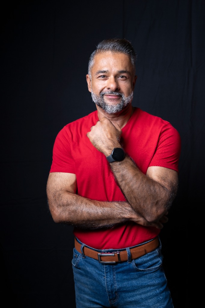 Lifestyle - Red t-shirt confident pose